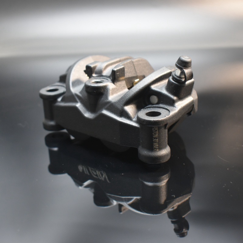 Pinza de freno forjada Nissin  - Forged Front Brake Caliper 4 Piston reseña y precio